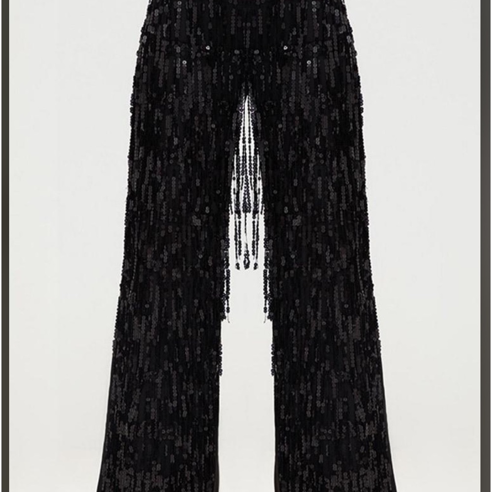 Black denim jeans, embellished tassels